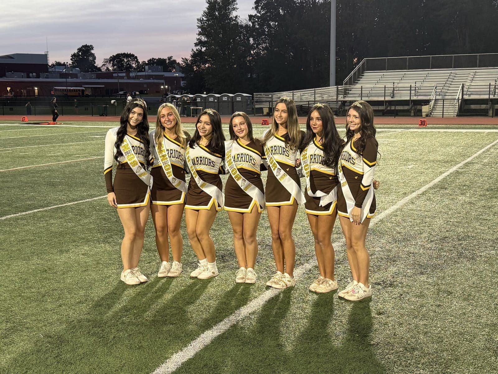 Watchung Hills cheerleaders wear Class of 2027 senior sashes during a senior recognition.